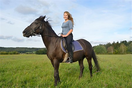reiterin - Teenage Girl Riding Arabo-Haflinger on Meadow, Upper Palatinate, Bavaria, Germany Stockbilder - Lizenzpflichtiges, Bildnummer: 700-07148190