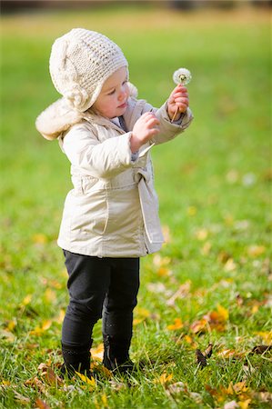 Portrait of Baby Girl with Dandelion in Autumn, Scanlon Creek Conservation Area, Ontario, Canada Stock Photo - Rights-Managed, Code: 700-07199777