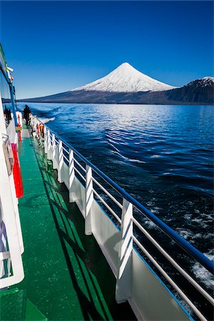 Close-up of tour boat on Cruce Andino, looking toward Osorno Volcano, Lake Todos los Santos, Parque Nacional Vicente Perez Rosales, Patagonia, Chile Photographie de stock - Rights-Managed, Code: 700-07202719