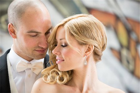 simsearch:700-07311366,k - Close-up portrait of bride and groom looking at each other outdoors on Wedding Day, Canada Stock Photo - Rights-Managed, Code: 700-07237584