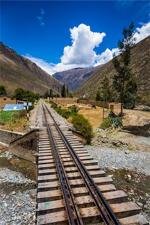 sacred valley - Train rails beside rural home on scenic journey through the Sacred Valley of the Incas in the Andes mountains, Peru Photographie de stock - Rights-Managed, Code: 700-07238021
