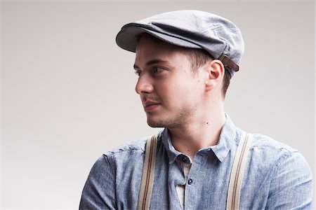 schiebermütze - Portrait of Young Man, Studio Shot Stockbilder - Lizenzpflichtiges, Bildnummer: 700-07238137