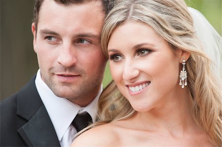 simsearch:700-07199750,k - Close-up portrait of bride and groom smiling outdoors on Wedding Day, Canada Foto de stock - Con derechos protegidos, Código: 700-07232335