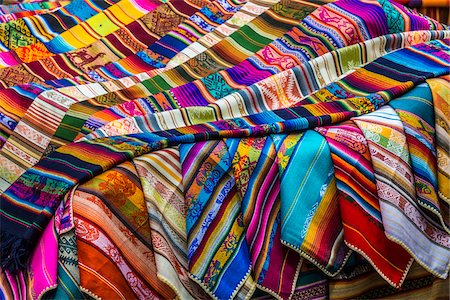 Colorful Material Displayed at Clothing Market, Otavalo, Ecuador Stockbilder - Lizenzpflichtiges, Bildnummer: 700-07279159