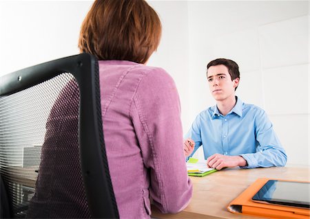 entrevista de trabajo - Teenager Working in Office, Mannheim, Baden-Wurttemberg, Germany Foto de stock - Con derechos protegidos, Código: 700-07311324