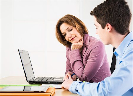 Teenager Working in Office, Mannheim, Baden-Wurttemberg, Germany Foto de stock - Con derechos protegidos, Código: 700-07311329