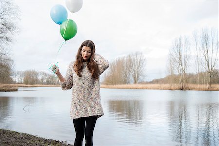 Portrait of Young Woman Outdoors with Balloons, Mannheim, Baden-Wurttemberg, Germany Photographie de stock - Rights-Managed, Code: 700-07364035