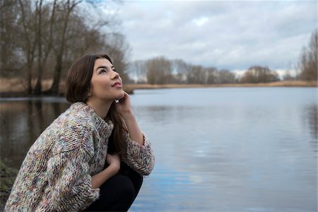 person looking up at sky clouds - Portrait of Young Woman by Lake, Mannheim, Baden-Wurttemberg, Germany Photographie de stock - Rights-Managed, Code: 700-07364037