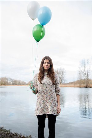 Portrait of Young Woman Outdoors with Balloons, Mannheim, Baden-Wurttemberg, Germany Stock Photo - Rights-Managed, Code: 700-07364031