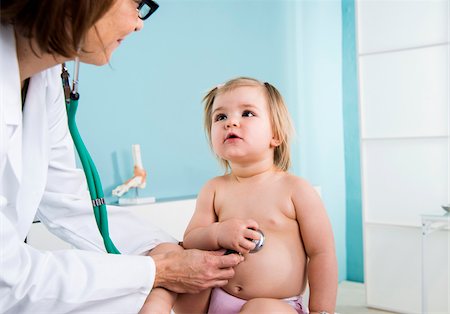 stethoskop - Doctor with Baby Girl in Doctor's Office Stockbilder - Lizenzpflichtiges, Bildnummer: 700-07453723