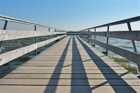 simsearch:700-07487490,k - Low Angle View of Wooden Jetty, Born auf dem Darss, Barther Bodden, Fischland-Darss-Zingst, Mecklenburg-Vorpommern, Germany Stock Photo - Rights-Managed, Code: 700-07487487