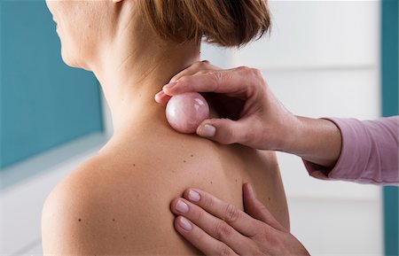 Doctor giving Woman Massage with Ball Stock Photo - Rights-Managed, Code: 700-07487568