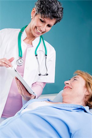 fifty years old blonde - Doctor Examining Senior Patient in Doctor's Office Stock Photo - Rights-Managed, Code: 700-07487593