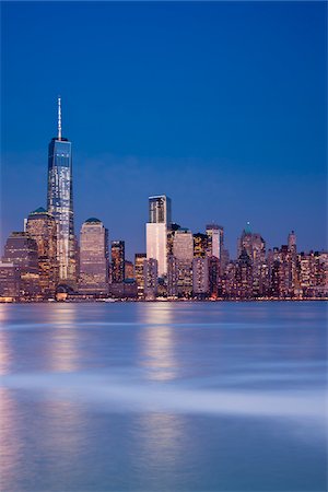 simsearch:649-08328534,k - City Skyline Illuminated at Dusk with One World Trade Centre, Lower Manhattan, New York City, New York, USA Stock Photo - Rights-Managed, Code: 700-07529141