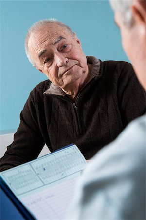doctor elderly patient - Senior male patient consulting doctor in office, Germany Stock Photo - Rights-Managed, Code: 700-07529227