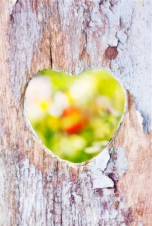 Close-up of Heart Carved into Wood of Old Seat Stock Photo - Rights-Managed, Code: 700-07541418