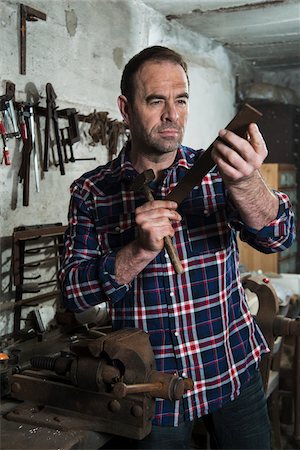 simsearch:600-06679376,k - Mature Man in Workshop with Tools Stock Photo - Rights-Managed, Code: 700-07562404