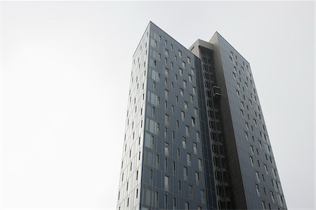 Upper section of Office Building against sky, Hamburg, Germany Stock Photo - Rights-Managed, Code: 700-07599799