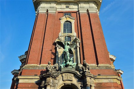 simsearch:700-07564079,k - Close-up of statue of Archangel Michael over portal at St Michaelis Church, Hamburg, Germany Stock Photo - Rights-Managed, Code: 700-07599805