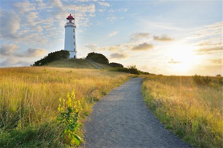 sun bright sky - Path to Lighthouse on the Dornbusch in the Morning with Sun, Summer, Baltic Island of Hiddensee, Baltic Sea, Western Pomerania, Germany Stock Photo - Rights-Managed, Code: 700-07599831