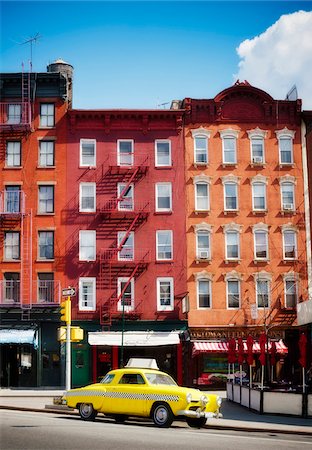 photos of sky - Traditional red brick buildings and old car in the trendy Chelsea district, Manhattan, New York City, NY, USA Stock Photo - Rights-Managed, Code: 700-07698669