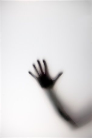 Blurred Hand and Arm through Frosted Glass Stock Photo - Rights-Managed, Code: 700-07729951