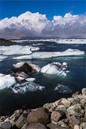 simsearch:879-09189326,k - Close-up of shoreline with ice and scenic view of glacial lake water, Jokulsarlon, Iceland Foto de stock - Con derechos protegidos, Código: 700-07760055