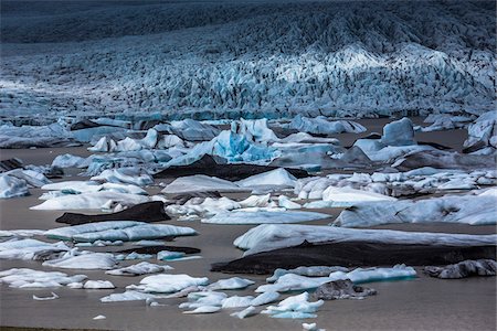 View of glacial ice in lake with glacier in background, Fjallsarlon Glacier, Iceland Photographie de stock - Rights-Managed, Code: 700-07760072