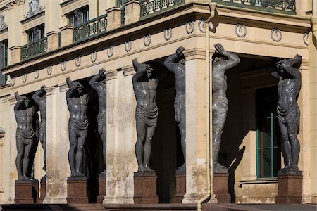 palais d'hiver - Atlantes of the Hermitage, statues holding up the portico of the Hermitage Museum, St. Petersburg, Russia Photographie de stock - Rights-Managed, Code: 700-07760205