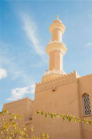 simsearch:700-07784142,k - Tower of Mosque against Blue Sky with Leaves in the foreground, Muscat, Oman Stock Photo - Rights-Managed, Code: 700-07784133