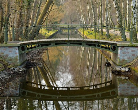 foot bridge over stream - Bridge over Creek on Castle Grounds, Schwerin Castle, Schwerin, Western Pomerania, Mecklenburg-Vorpommern, Germany Stock Photo - Rights-Managed, Code: 700-07784566