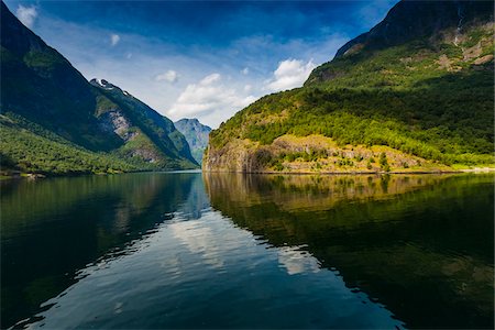 reflection of mountains - Naeroyfjord, Sognefjord, Aurland, Sogn og Fjordane, Norway Stock Photo - Rights-Managed, Code: 700-07784634