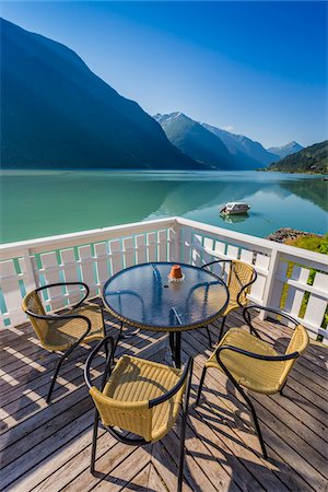 simsearch:700-07849693,k - Table and Chairs on Patio, Fjaerland Fjordstue Hotel, Mundal, Fjaerland, Sogn og Fjordane, Norway Photographie de stock - Rights-Managed, Code: 700-07784688