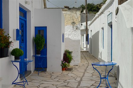 european street view - Blue tables in street in mountain village, Greece Stock Photo - Rights-Managed, Code: 700-07783720