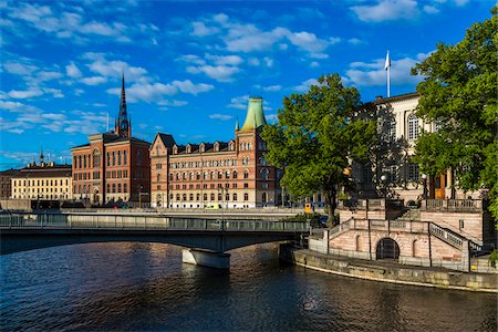 stockholm - Stromsborgsbron Bridge along the Norrstrom River with the Gamla Riksarkivet (Old National Archives building) and Norstedt Building, Riddarholmen, Stockholm, Sweden Stock Photo - Rights-Managed, Code: 700-07783796