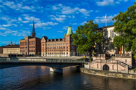 simsearch:700-07783815,k - Stromsborgsbron Bridge along the Norrstrom River with the Gamla Riksarkivet (Old National Archives building) and Norstedt Building, Riddarholmen, Stockholm, Sweden Stock Photo - Rights-Managed, Code: 700-07783796