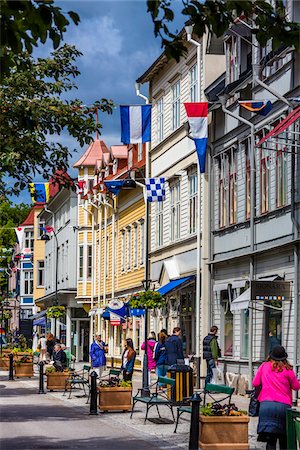 swedish flag - Street scene in Vaxholm near Stockholm, Sweden Stockbilder - Lizenzpflichtiges, Bildnummer: 700-07783856