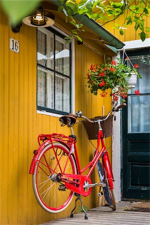 Bicycle parked at entrance of home in Vaxholm near Stockholm, Sweden Stock Photo - Rights-Managed, Code: 700-07783857