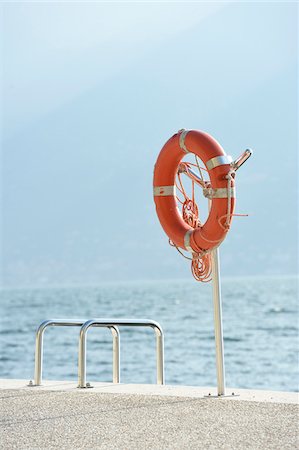 Life Ring at Beach in Autumn, Lago di Garda, Italy Stock Photo - Rights-Managed, Code: 700-07810480