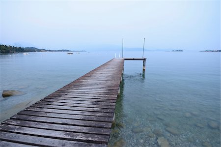 dock, not person - Jetty in Evening in Autumn, Lago di Garda, Italy Stock Photo - Rights-Managed, Code: 700-07810574