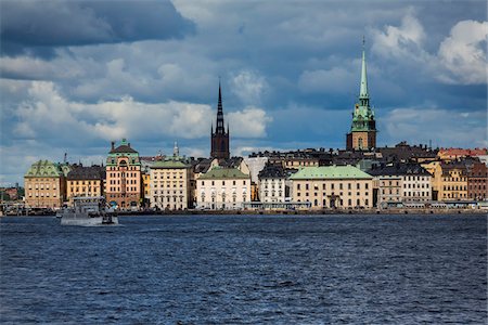 scandinavian - Waterfront of Gamla Stan (Old Town) with Riddarholmen Church on left and Old German Church on right, Stockholm, Sweden Stock Photo - Rights-Managed, Code: 700-07849666