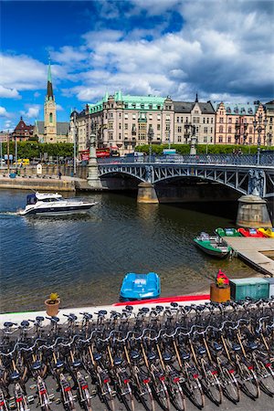 estocolma - Bicycles and paddle boats for rent next to the Djurgarden Bridge on the island of Djurgarden, Stockholm, Sweden Foto de stock - Con derechos protegidos, Código: 700-07849673