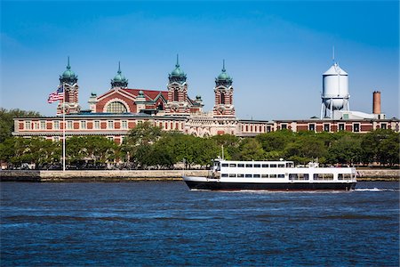 famous buildings in usa - Tour boat on Upper New York Bay, Ellis Island, New York City, New York, USA Photographie de stock - Rights-Managed, Code: 700-07849717