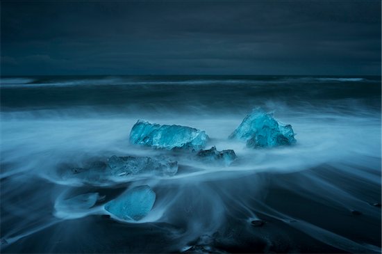 Icebergs Stranded on Stormy Beach in Winter, Iceland Stock Photo - Premium Rights-Managed, Artist: JW, Image code: 700-07840745