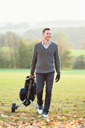 Man Playing Golf on Golf Course in Autumn, Bavaria, Germany Stock Photo - Rights-Managed, Code: 700-07942502