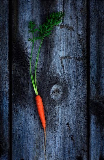 Organic Carrot on Wooden Background Stock Photo - Premium Rights-Managed, Artist: JW, Image code: 700-07965824