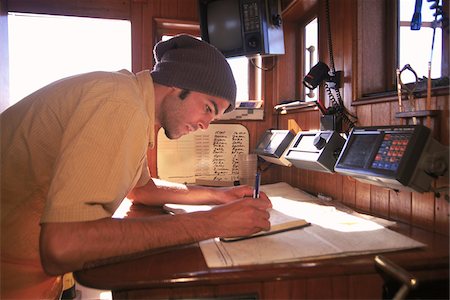 Man makes Entry into Log Book aboard Schooner, Tree of Life Stock Photo - Rights-Managed, Code: 700-07965866