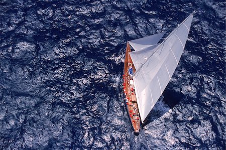 Aerial View from Helicopter of Endeavour Racing off Coast of Antigua during 2001 Antigua Classic Yacht Regatta Foto de stock - Con derechos protegidos, Código: 700-07965868