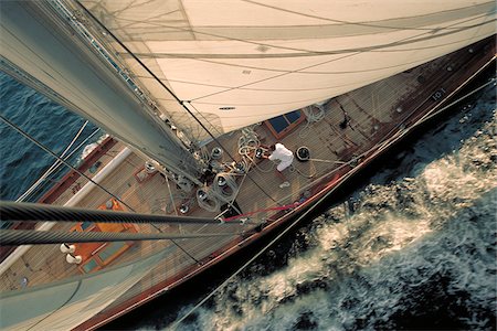 Man Trims Sails aboard Shamrock V while Sailing in Narragansett Bay, Newport, Rhode Island, USA Foto de stock - Con derechos protegidos, Código: 700-07965861