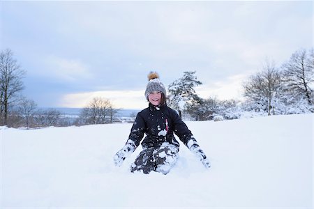 snow - Portrait of a girl playing in the snow, winter, Bavaria, Germany Stock Photo - Rights-Managed, Code: 700-07991780